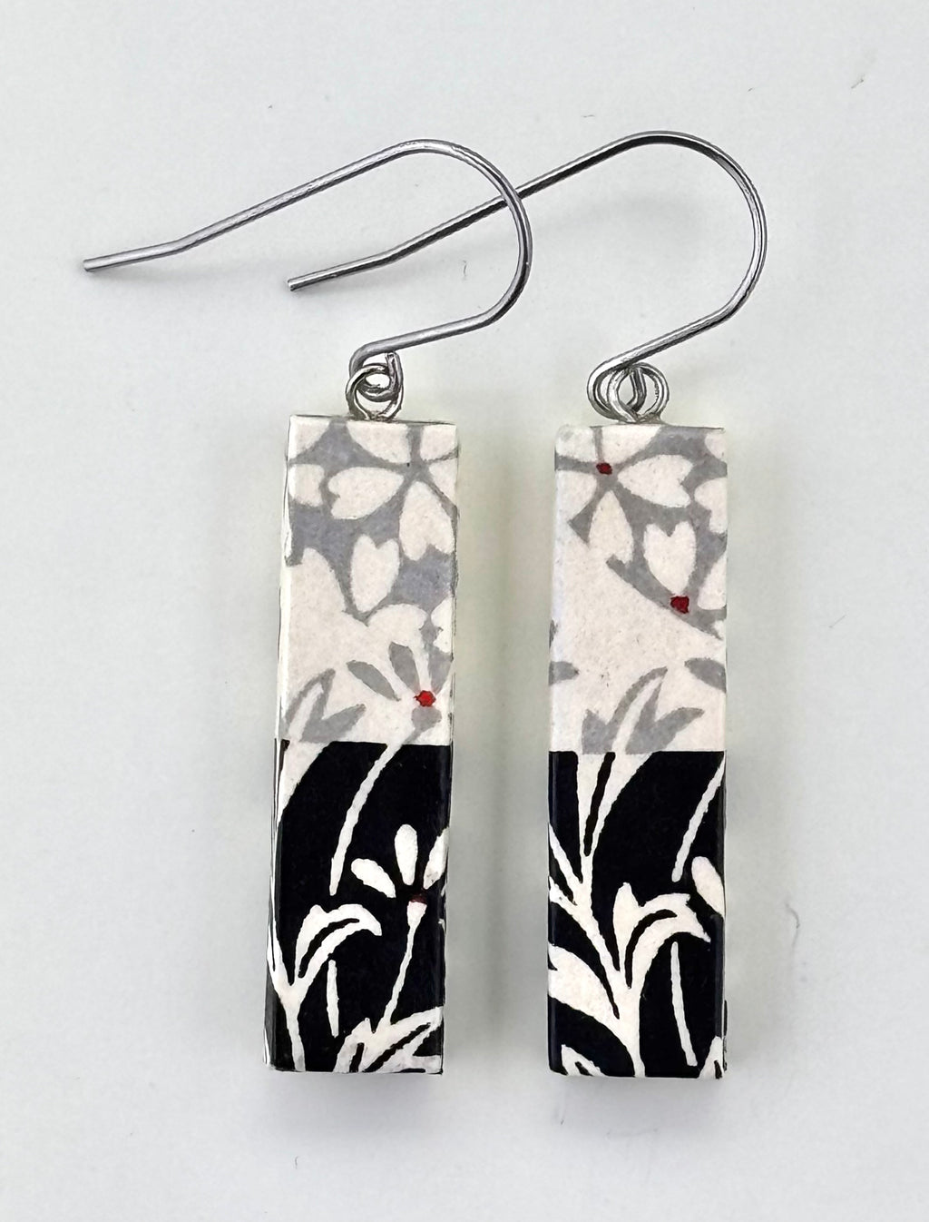 Yuzen paper bar earrings — black & white reed motif, handmade in Australia by a Japanese artisan (front view)