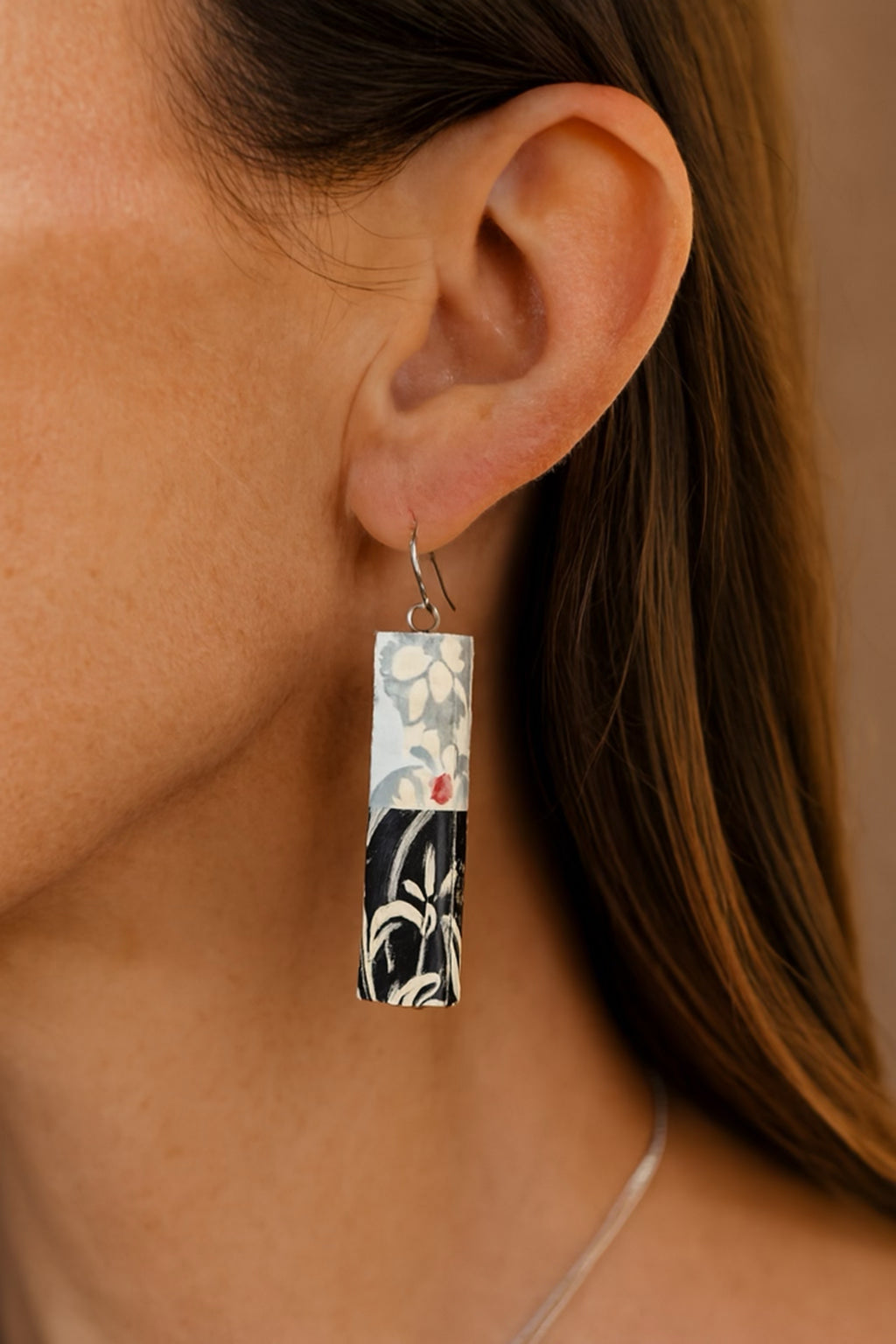 Yuzen paper bar earrings — black & white reed motif, handmade in Australia by a Japanese artisan (On Model)